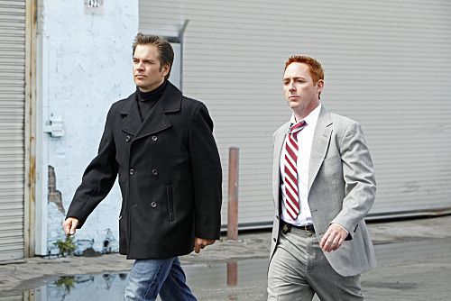 "Baltimore" - After Tony's (Michael Weatherly, left) ex-partner, Danny Price (guest star Scott Grimes, right), appears to be the Port-to-Port Killer's latest victim, he revisits his days as a detective in Baltimore, including his first encounter with Gibbs, on NCIS, Tuesday, May 3 (8:00-9:00 PM, ET/PT) on the CBS Television Network. Photo: Monty Brinton/CBS ©2011 CBS Broadcasting Inc. All Rights Reserved
