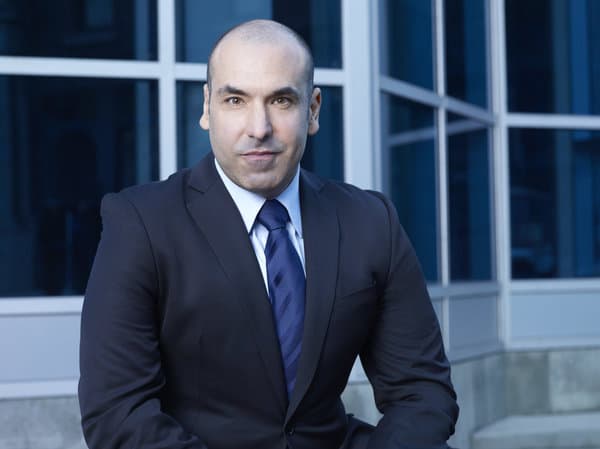 SUITS -- Season: 2 -- Pictured: Rick Hoffman as Louis Litt -- Photo by: Robert Ascroft/USA Network