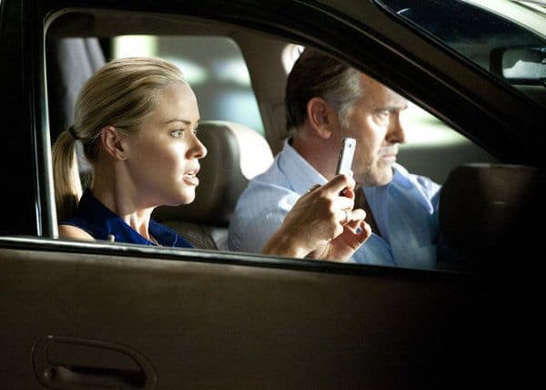 BURN NOTICE -- Episode 605 -- Pictured: (l-r) Kristanna Loken as Rebecca Lang, Bruce Campbell as Sam Axe -- (Photo by Glenn Watson/USA Network) BURN NOTICE -- Episode 605 -- Pictured: (l-r) Kristanna Loken as Rebecca Lang, Bruce Campbell as Sam Axe -- (Photo by Glenn Watson/USA Network)