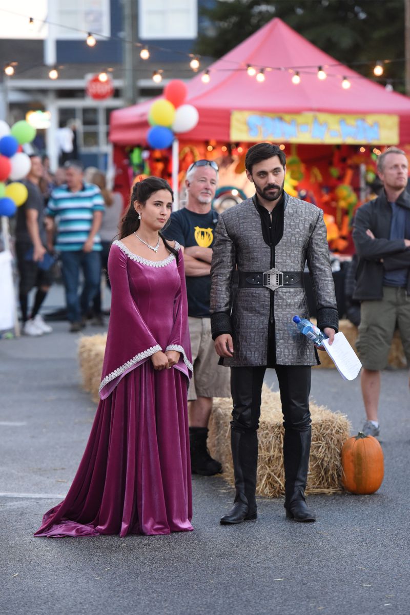 ONCE UPON A TIME - "Dreamcatcher" - In Camelot, as Mary Margaret and David attempt to retrieve the Dark One dagger, Emma uses a dreamcatcher to look into the past to see how Merlin was transformed into a tree. Together, Emma and Regina figure out the critical ingredient they must acquire to free Merlin, but it's a race against Arthur, who does not want Merlin released. Meanwhile, with encouragement from his moms, Henry musters up the courage to ask Violet on a date. Back in Storybrooke, the heroes break into Emma's house hoping to locate Gold, but what they find will give them a glimpse of Emma's end game. Far from prying eyes, Merida sets about the mission Emma has tasked her with and begins molding Gold into the hero they need to draw Excalibur, on "Once Upon a Time," SUNDAY, OCTOBER 25 (8:00-9:00 p.m., ET) on the ABC Television Network. (ABC/Dean Buscher) JOANA METRASS, LIAM GARRIGAN