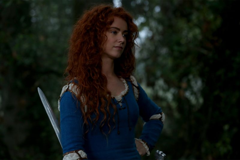 ONCE UPON A TIME - "Dreamcatcher" - In Camelot, as Mary Margaret and David attempt to retrieve the Dark One dagger, Emma uses a dreamcatcher to look into the past to see how Merlin was transformed into a tree. Together, Emma and Regina figure out the critical ingredient they must acquire to free Merlin, but it's a race against Arthur, who does not want Merlin released. Meanwhile, with encouragement from his moms, Henry musters up the courage to ask Violet on a date. Back in Storybrooke, the heroes break into Emma's house hoping to locate Gold, but what they find will give them a glimpse of Emma's end game. Far from prying eyes, Merida sets about the mission Emma has tasked her with and begins molding Gold into the hero they need to draw Excalibur, on "Once Upon a Time," SUNDAY, OCTOBER 25 (8:00-9:00 p.m., ET) on the ABC Television Network. (ABC/Jack Rowand) AMY MANSON
