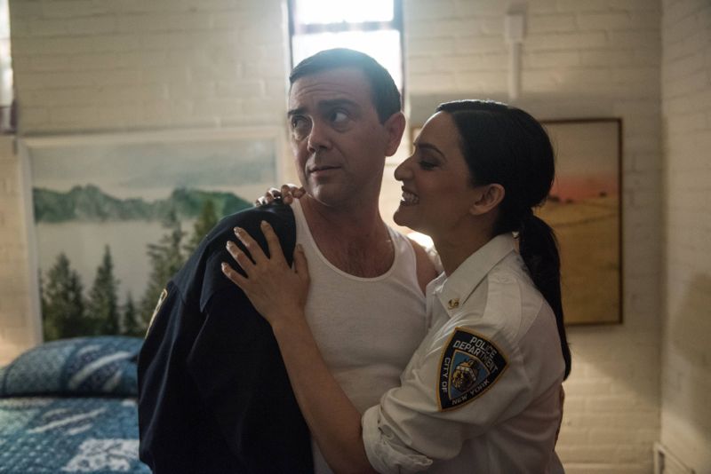 BROOKLYN NINE-NINE: Charles (Joe Lo Truglio, L) and Lieutenant Thakurta (guest star Archie Panjabi, R) in the "The Funeral" episode of BROOKLYN NINE-NINE airing Sunday, Oct. 4 (8:30-9:00 PM ET/PT) on FOX. ©2015 Fox Broadcasting Co. CR: Eddy Chen/FOX.