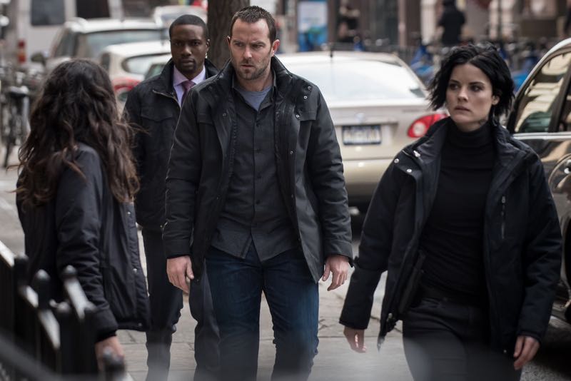 BLINDSPOT -- "Mans Telepathic Loyal Lookouts" Episode 117 -- Pictured: (l-r) Rob Brown as Edgar Reed, Sullivan Stapleton as Kurt Weller, Jaimie Alexander as Jane Doe -- (Photo by: Jeff Neumann/NBC)