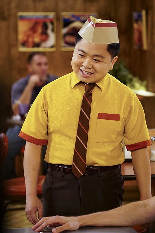 "And The Two Openings: Part One" -- Pictured: Han Lee (Matthew Moy). As Max and Caroline, now part owners of the diner, put the finishing touches on their newly converted Dessert Bar, Max deals with the aftermath of her recent breakup with Randy, and Sophie and Oleg prepare for the birth of their baby, on the sixth season premiere of 2 BROKE GIRLS, Monday, Oct. 10 (9:00-9:30 PM, ET/PT) on the CBS Television Network. Photo: Sonja Flemming/CBS é2016 CBS Broadcasting, Inc. All Rights Reserved