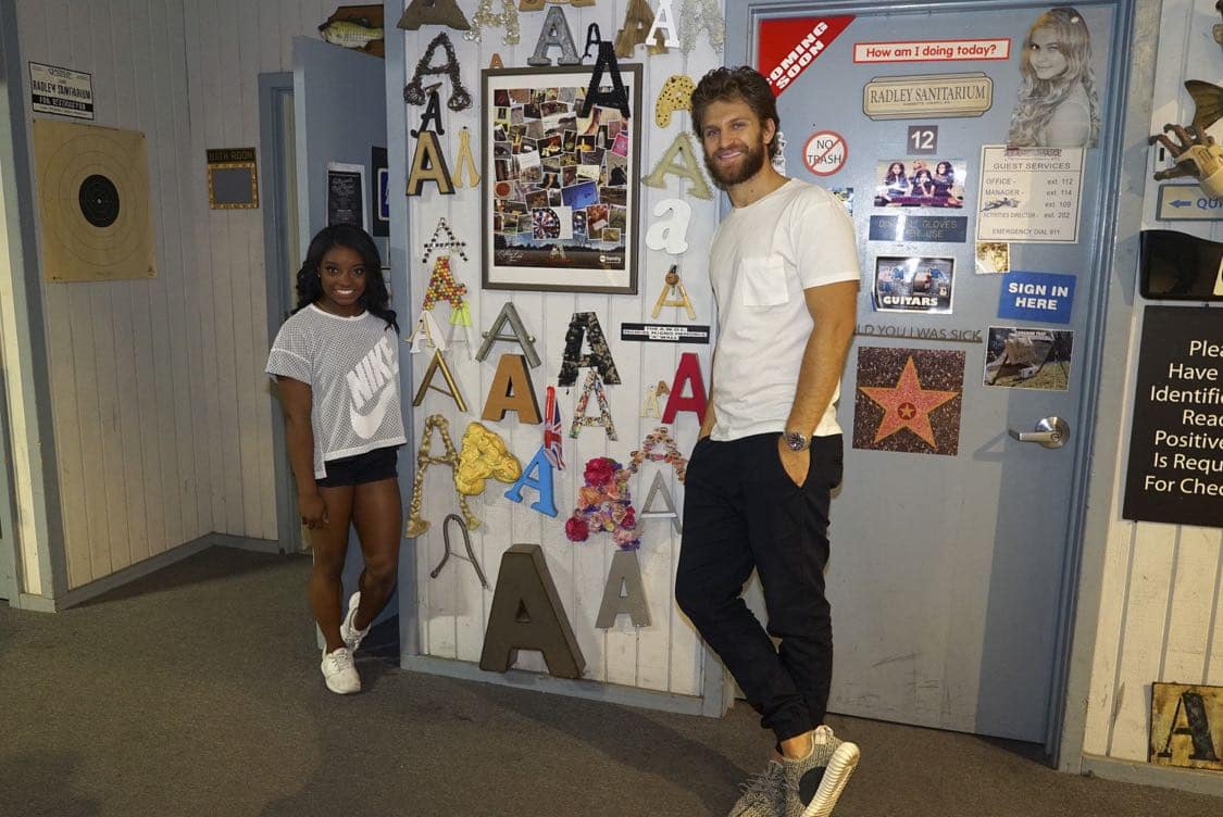 PRETTY LITTLE LIARS - USA Olympic gold medal gymnast Simone Biles visits the set of 'Pretty Little Liars.'" (Freeform/Byron Cohen) SIMONE BILES, KEEGAN ALLEN