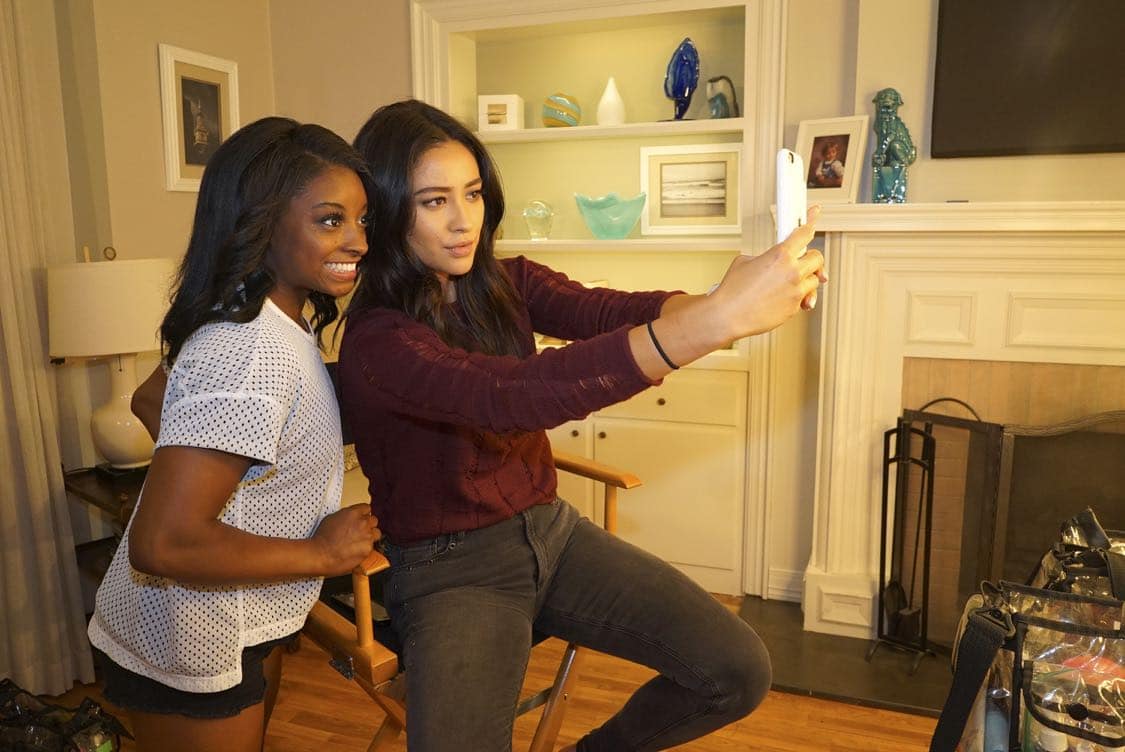 PRETTY LITTLE LIARS - USA Olympic gold medal gymnast Simone Biles visits the set of 'Pretty Little Liars.'" (Freeform/Byron Cohen) SIMONE BILES, SHAY MITCHELL