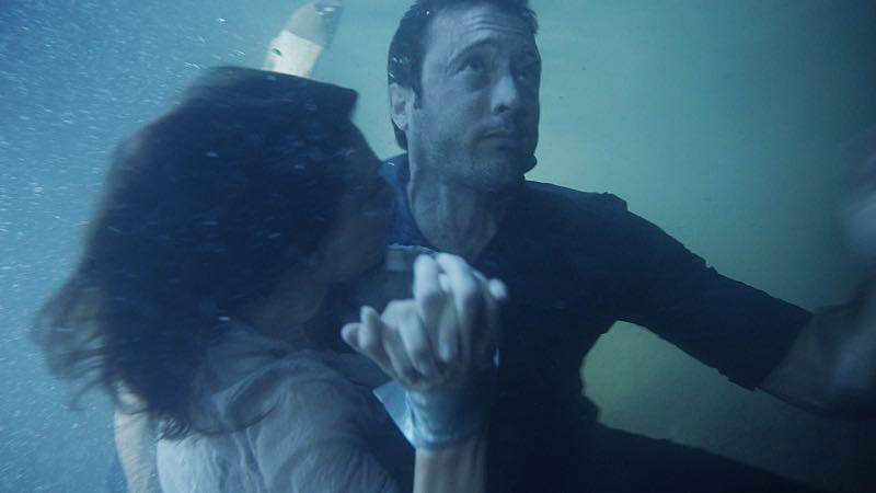 "HÃ
« a'e ke ahi lanakila a Kamaile" -- Five-0 must find McGarrett and Alicia when they are kidnapped by the serial killer they've been hunting, on HAWAII FIVE-0, Friday, Oct. 14 (9:00-10:00 PM, ET/PT), on the CBS Television Network. Former professional football player Otis Wilson guest stars as himself. Pictured left to right: Claire Forlani as Alicia Brown and Alex O'Loughlin as Steve McGarrett. Photo: CBS é2016 CBS Broadcasting, Inc. All Rights Reserved ("HÃ
« a'e ke ahi lanakila a Kamaile" is Hawaiian for "The Fire of Kamile Rises in Triumph")