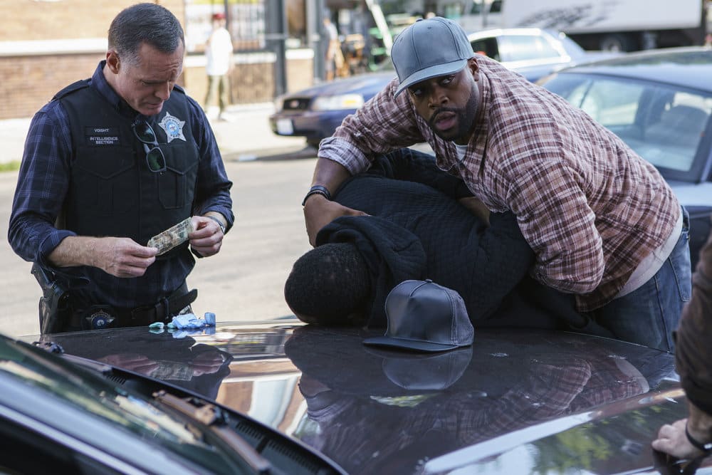 CHICAGO P.D. -- "A War Zone" Episode 404 -- Pictured: (l-r) Jason Beghe as Hank Voight, LaRoyce Hawkins as Kevin Atwater -- (Photo by: Parrish Lewis/NBC)