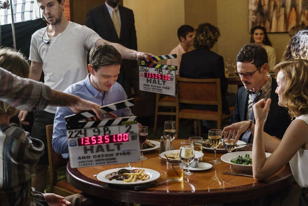 BTS, Scoot McNairy as Gordon Clark, Mackenzie Davis as Cameron Howe, Mark O'Brien as Tom Rendon - Halt and Catch Fire _ Season 3, Episode 7 - Photo Credit: Tina Rowden/AMC