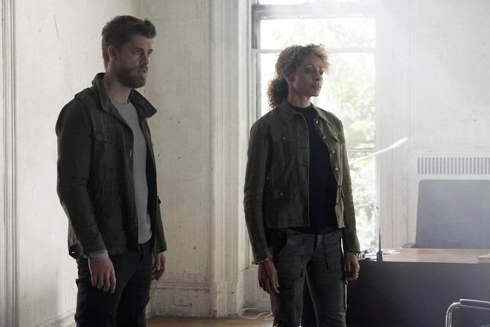 BLINDSPOT -- "Why Let Cooler Pasture Deform" Episode 209 -- Pictured: (l-r) Luke Mitchell as Roman, Michelle Hurd as Shepherd -- (Photo by: Virginia Sherwood/NBC) BLINDSPOT -- "Why Let Cooler Pasture Deform" Episode 209 -- Pictured: (l-r) Luke Mitchell as Roman, Michelle Hurd as Shepherd -- (Photo by: Virginia Sherwood/NBC)