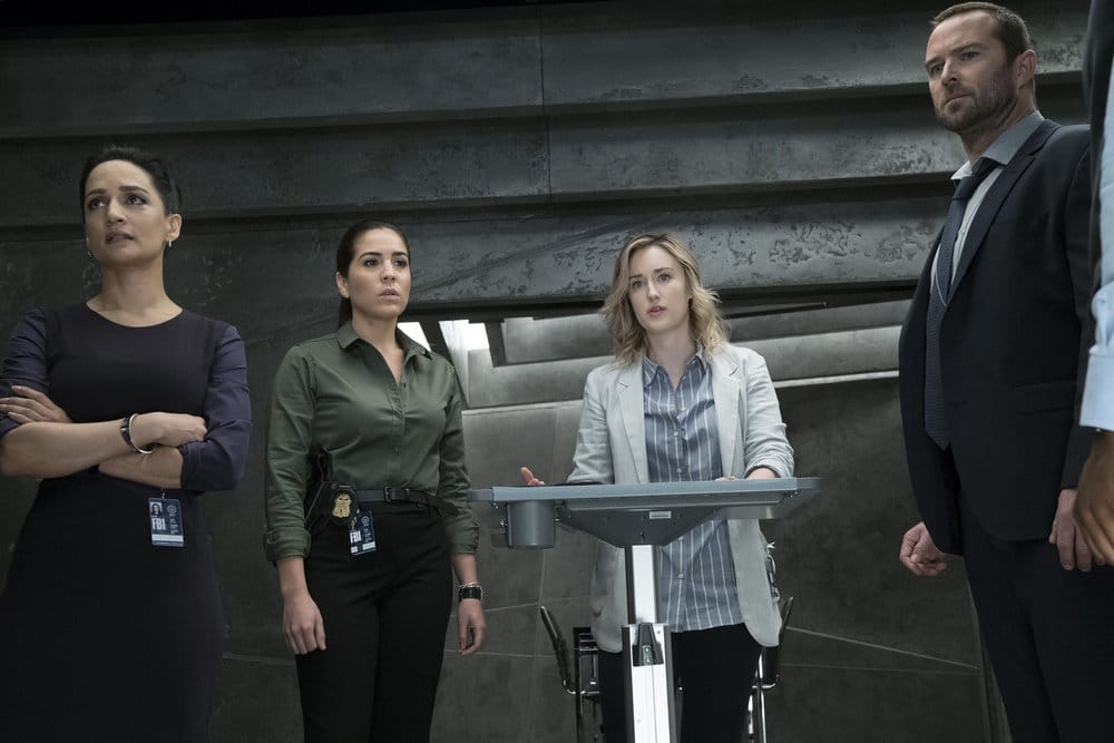 BLINDSPOT -- "Why Let Cooler Pasture Deform" Episode 209 -- Pictured: (l-r) Archie Panjabi as Nas Kamal, Audrey Esparza as Tasha Zapata, Ashley Johnson as Patterson, Sullivan Stapleton as Kurt Weller -- (Photo by: Virginia Sherwood/NBC)