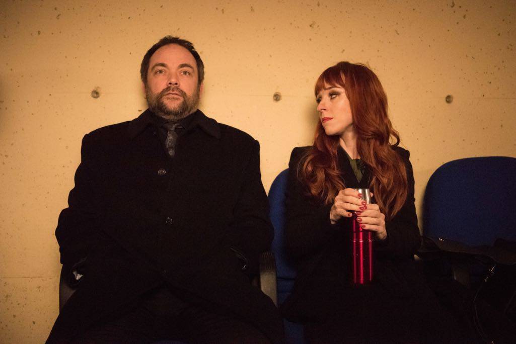 Supernatural --"Family Feud"-- SN1213a_0401.jpg -- Pictured (L-R): Mark Sheppard as Crowley and Ruth Connell as Rowena Supernatural --"Family Feud"-- SN1213a_0401.jpg -- Pictured (L-R): Mark Sheppard as Crowley and Ruth Connell as Rowena