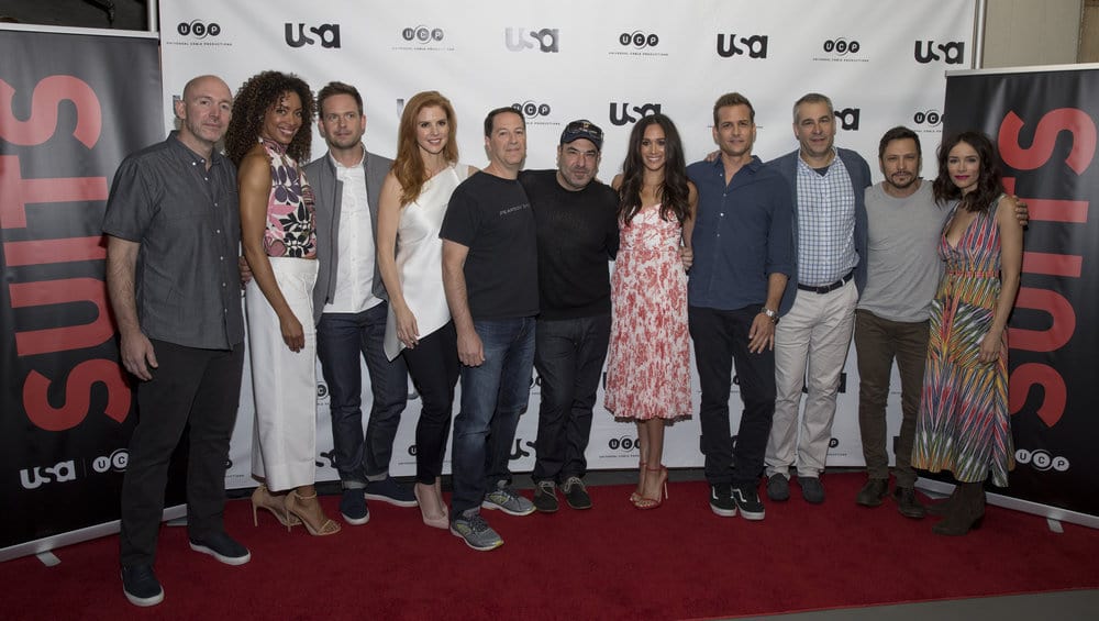 SUITS -- Script Reading Presented by USA Network -- Pictured: (l-r) Gene Klein, Gina Torres, Patrick J. Adams, Sarah Rafferty, Aaron Korsh, Rick Hoffman, Meghan Markle, Gabriel Macht, David Bartis, Nick Wechsler, and Abigail Spencer -- (Photo by: Rick Kern/USA Network) SUITS -- Script Reading Presented by USA Network -- Pictured: (l-r) Gene Klein, Gina Torres, Patrick J. Adams, Sarah Rafferty, Aaron Korsh, Rick Hoffman, Meghan Markle, Gabriel Macht, David Bartis, Nick Wechsler, and Abigail Spencer -- (Photo by: Rick Kern/USA Network)