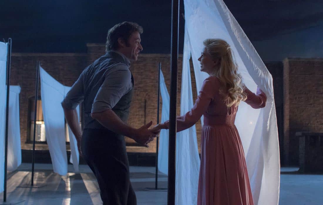 P.T. Barnum (Hugh Jackman) and Charity Barnum (Michelle Williams) share an enchanting dance on a New York rooftop in Twentieth Century Fox’s THE GREATEST SHOWMAN.