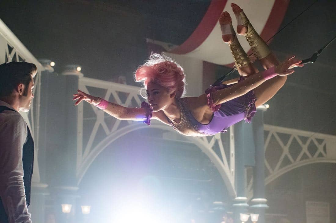 Philip (Zac Efron) is entranced by Anne’s (Zendaya) trapeze artistry in Twentieth Century Fox’s THE GREATEST SHOWMAN.