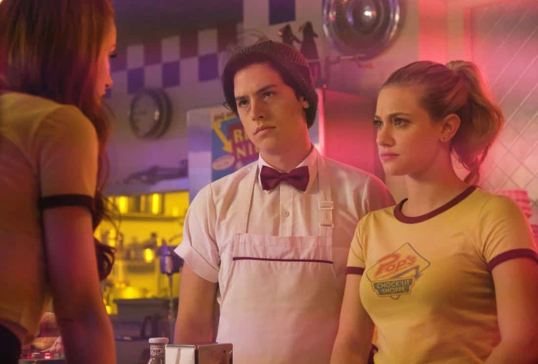 Riverdale -- "Chapter Fifteen: Nighthawks" -- Image Number: RVD202b_0156.jpg -- Pictured (L-R): Cole Sprouse as Jughead Jones and Lili Reinhart as Betty Cooper -- Photo: Bettina Strauss /The CW -- é 2017 The CW Network. All Rights Reserved Riverdale -- "Chapter Fifteen: Nighthawks" -- Image Number: RVD202b_0156.jpg -- Pictured (L-R): Cole Sprouse as Jughead Jones and Lili Reinhart as Betty Cooper -- Photo: Bettina Strauss /The CW -- é 2017 The CW Network. All Rights Reserved