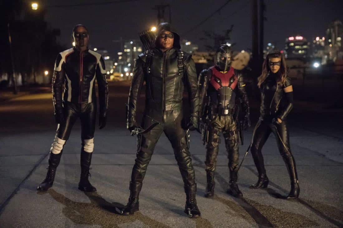 Arrow -- "Next of Kin" -- Image AR603b_0437b --Pictured (L-R): Echo Kellum as Curtis Holt/Mr.Terrific, David Ramsey as Green Arrow, Rick Gonzalez as Rene Ramirez/Wild, and Juliana Harkavy as Dinah Drake/Black Canary -- Photo: Jack Rowand/The CW -- é 2017 The CW Network, LLC. All Rights Reserved.