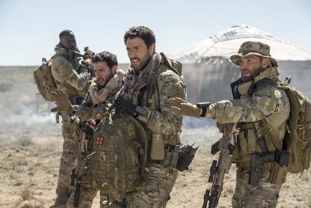 THE BRAVE -- "Stealth" Episode 108 -- Pictured: (l-r) Demetrius Grosse as CPO Ezekiel "Preach" Carter, Hadi Tabbal as Agent Amir Al-Raisani, Noah Mills as Sergeant Joseph "McG" McGuire, Mike Vogel as Captain Adam Dalton -- (Photo by: Lewis Jacobs/NBC)