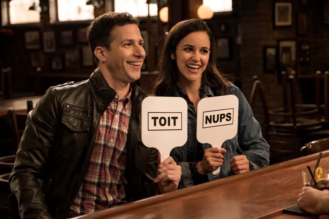 BROOKLYN NINE-NINE: L-R: Melissa Fumero and Andy Samberg in the "The Venue" episode of BROOKLYN NINE-NINE airing Tuesday, Nov. 7 (9:30-10:00 PM ET/PT) on FOX. CR: John P. Fleenor/FOX