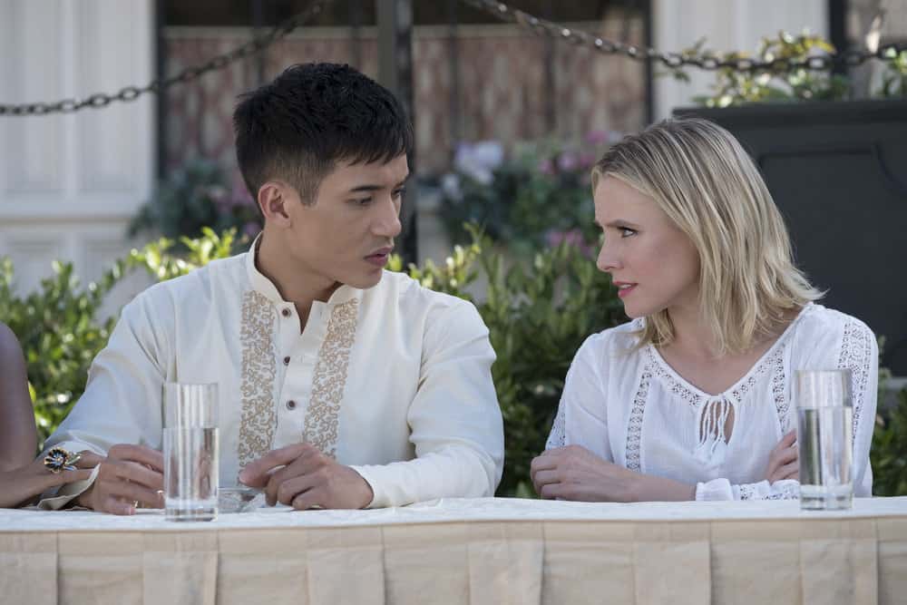 THE GOOD PLACE -- "Leap Into Faith" Episode 209 -- Pictured: (l-r) Manny Jacinto as Jianyu, Kristen Bell as Eleanor -- (Photo by: Colleen Hayes/NBC)