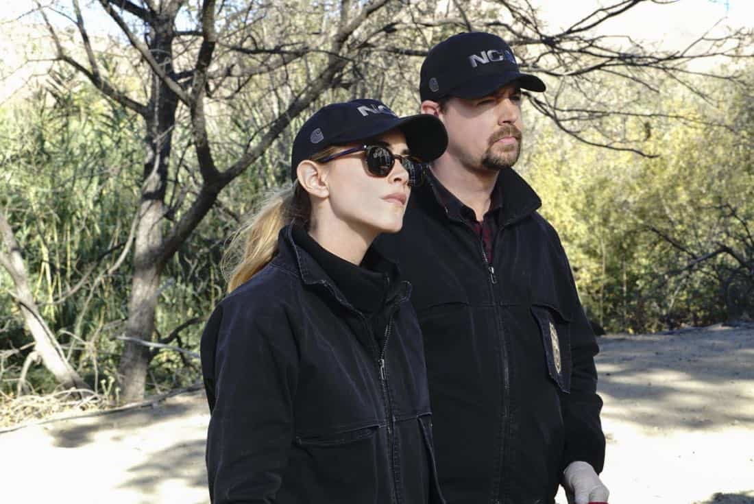 "Family Ties" -- After McGee and Torres visit the home of a high schooler who witnessed a hit and run, her parents, Christopher (Jamie Kaler) and Julie Bell (Gabrielle Carteris), flee with their daughter, leaving NCIS in the lurch. Also, Vance's daughter is arrested for shoplifting, on NCIS, Tuesday, Jan. 23 (8:00-9:00 PM, ET/PT) on the CBS Television Network. Pictured: Emily Wickersham, Sean Murray. Photo: Bill Inoshita/CBS é2017 CBS Broadcasting, Inc. All Rights Reserved