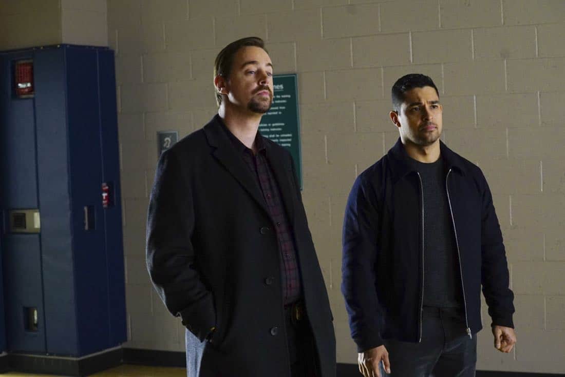 "Family Ties" -- After McGee and Torres visit the home of a high schooler who witnessed a hit and run, her parents, Christopher (Jamie Kaler) and Julie Bell (Gabrielle Carteris), flee with their daughter, leaving NCIS in the lurch. Also, Vance's daughter is arrested for shoplifting, on NCIS, Tuesday, Jan. 23 (8:00-9:00 PM, ET/PT) on the CBS Television Network. Pictured: Sean Murray, Wilmer Valderrama. Photo: Monty Brinton/CBS é2017 CBS Broadcasting, Inc. All Rights Reserved