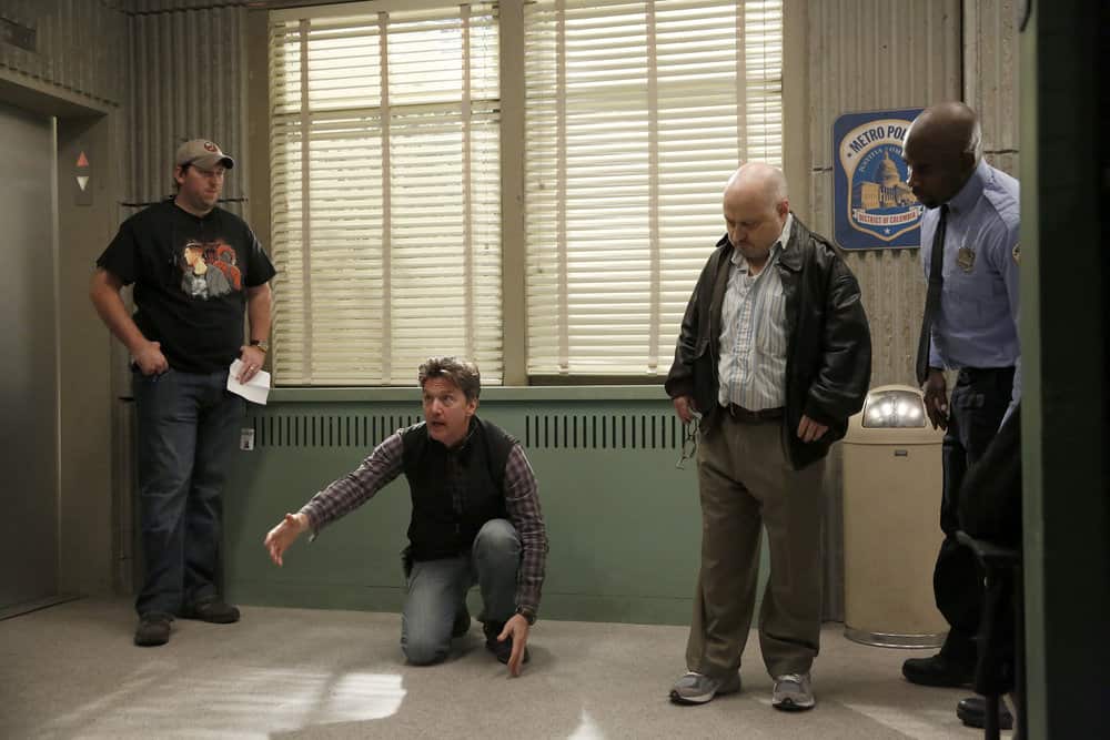 THE BLACKLIST -- "Abraham Stern (#100)" Episode 511 -- Pictured: (l-r) Director Andrew McCarthy, Clark Middleton as Glen, Marlon Perrier as Mingling Officer -- (Photo by: Will Hart/NBC)