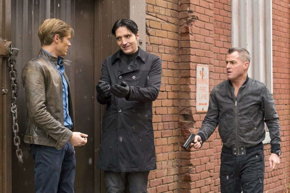 "Murdoc + Handcuffs" -- After one of Murdoc's go-to assassins agrees to hand over Murdoc to MacGyver in exchange for $10 million, the team finds itself protecting Murdoc from his former mentor, Nicholas Helman, who wants him dead. Also, Jack realizes he may still have feelings for Riley's mother, Diane (Michael Michele), on MACGYVER, Friday, Feb. 2 (8:00-9:00 PM ET/PT) on the CBS Television Network. Michael Des Barres, who played Murdoc in the original "MacGyver" series, guest stars as Murdoc's mentor, Nicholas Helman. Pictured: Lucas Till, David Dastmalchian, George Eads. Photo: Annette Brown/CBS é2017 CBS Broadcasting, Inc. All Rights Reserved "Murdoc + Handcuffs" -- After one of Murdoc's go-to assassins agrees to hand over Murdoc to MacGyver in exchange for $10 million, the team finds itself protecting Murdoc from his former mentor, Nicholas Helman, who wants him dead. Also, Jack realizes he may still have feelings for Riley's mother, Diane (Michael Michele), on MACGYVER, Friday, Feb. 2 (8:00-9:00 PM ET/PT) on the CBS Television Network. Michael Des Barres, who played Murdoc in the original "MacGyver" series, guest stars as Murdoc's mentor, Nicholas Helman. Pictured: Lucas Till, David Dastmalchian, George Eads. Photo: Annette Brown/CBS é2017 CBS Broadcasting, Inc. All Rights Reserved