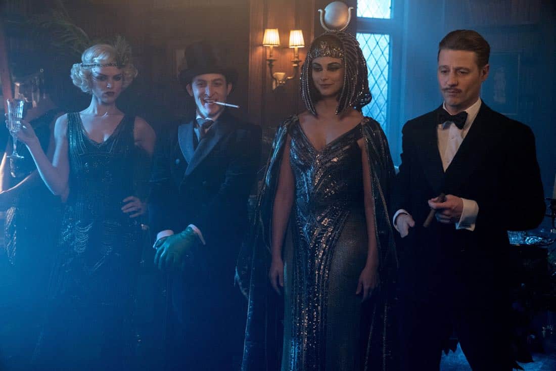 GOTHAM: L-R: Erin Richards, Robin Lord Taylor, Morena Baccarin and Ben McKenzie in the “A Dark Knight: A Beautiful Darkness” episode of GOTHAM airing Thursday, March 8 (8:00-9:00 PM ET/PT) on FOX. ©2018 Fox Broadcasting Co. Cr: David Giesbrecht/FOX