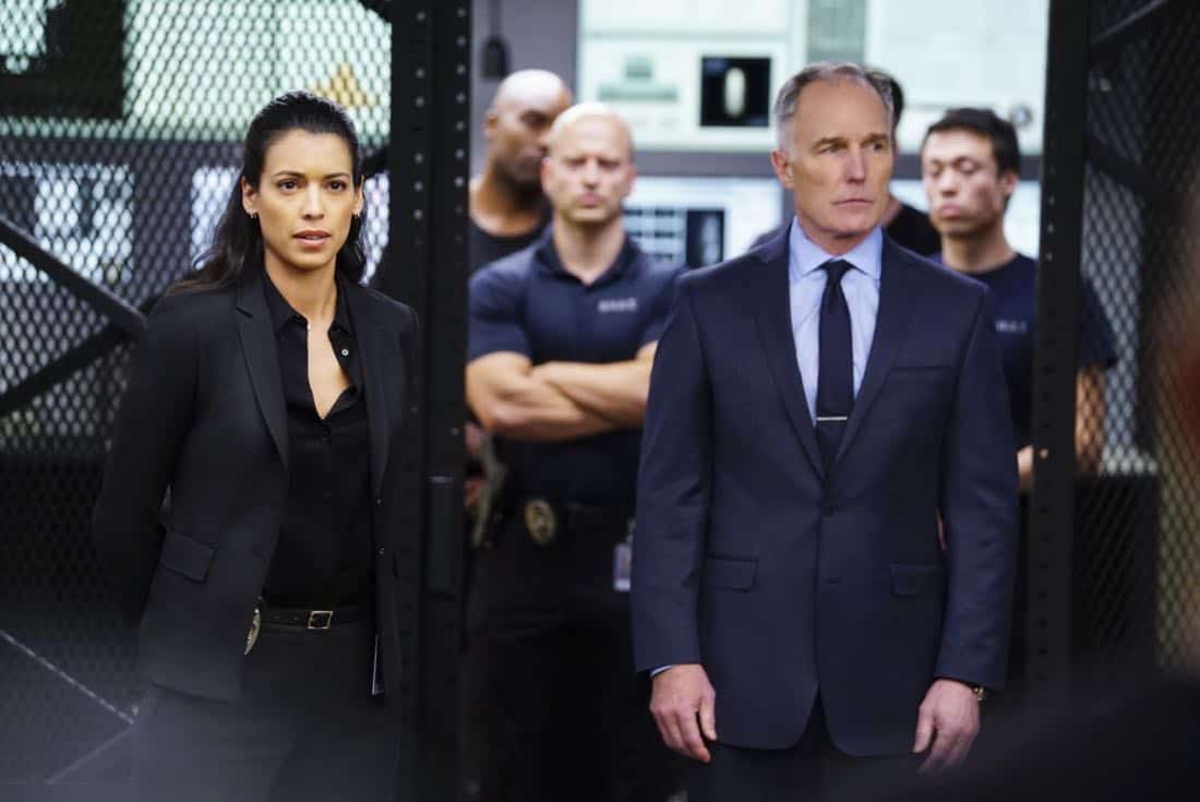 "Ghosts" - Hondo and the team go on the hunt for a serial killer who escaped justice two years prior by faking his death. Also, Hondo worries that Buck Spivey (Louis Ferreira), the team's former leader, is spiraling into depression in the aftermath of being fired from the department, on S.W.A.T., Thursday, March 8 (10:00-11:00 PM, ET/PT) on the CBS Television Network. Pictured left to right: Stephanie Sigman as Jessica Cortez and Patrick St. Esprit as Robert Hicks. Photo: Sonja Flemming/CBS é2018 CBS Broadcasting, Inc. All Rights Reserved