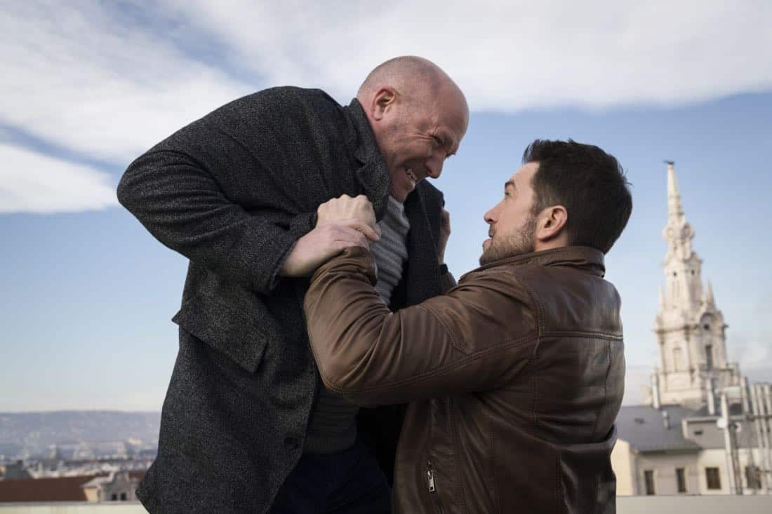 "Three Wishes" -- When Eric's daughter is kidnapped, he must fulfill three ransom demands from his long-time adversary, Damien Delaine (Carlo Rota), which include answering a series of emotionally challenging questions and performing ethically questionable tasks, in order to save what matters to him most -- his daughter's life -- on the second season premiere of RANSOM, Saturday, April 7 (8:00-9:00 PM, ET/PT) on the CBS Television Network. Pictured: Robert B. Kennedy (Armin Farber), Luke Roberts (Eric Beaumont) Photo: Dávid Lukács é 2018 Ransom Television Productions Inc.