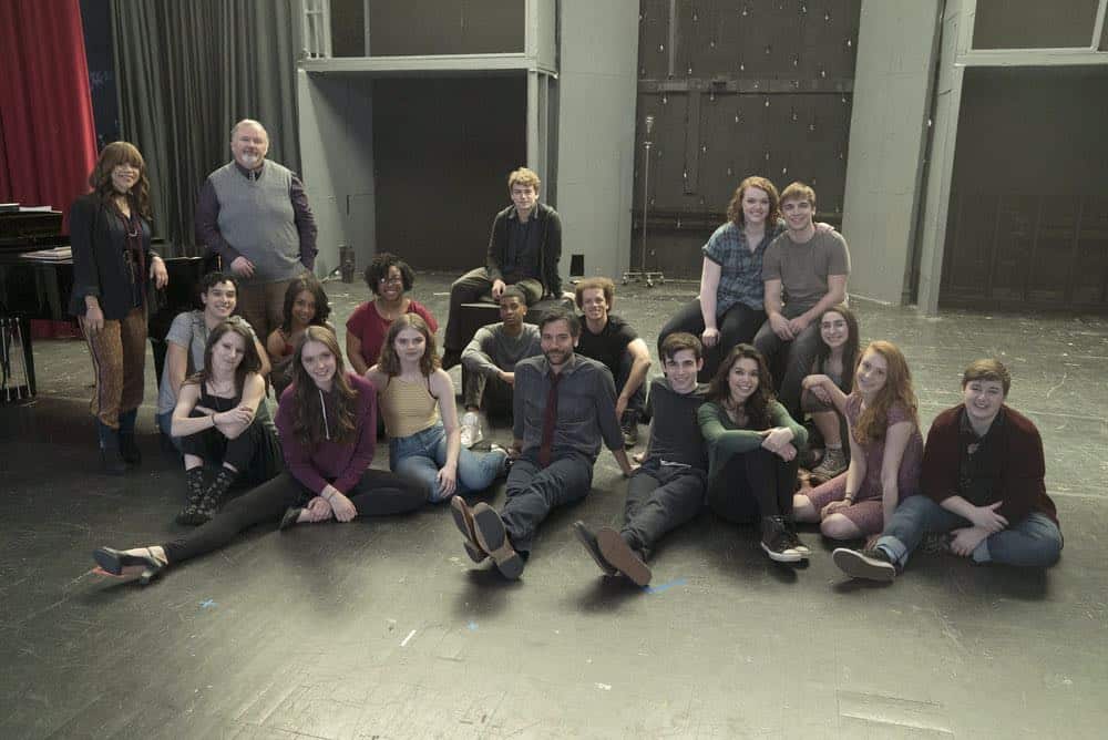 RISE -- Pilot -- Pictured: (l-r) Back row: Rosie Perez as Tracey Wolfe, Tom Riis Farrell as Mr. Baer, Rarmian Newton as Maashous Evers, Shannon Purser as Anabelle, Sean Grandillo as Jeremy Middle row: Joshua Grosso as Singer, Rachel Hilson as Harmony Curtis, Cheryl Bell as Singer, Brett Gray as Singer, Damon J. Gillespie as Robbie Thorne, Alexis Molnar as Singer Front row: Erin Kommor as Sasha, Amy Forsyth as Gwen Strickland, Katherine Reis as Jolene, Josh Radnor as Lou Mazzuchelli, Ted Sutherland as Simon Saunders, Auli'i Cravalho as Lilette Suarez, Caroline Pluta as Singer, Ellie Desautels as Michael Hallowell-- (Photo by: Peter Kramer/NBC) RISE -- Pilot -- Pictured: (l-r) Back row: Rosie Perez as Tracey Wolfe, Tom Riis Farrell as Mr. Baer, Rarmian Newton as Maashous Evers, Shannon Purser as Anabelle, Sean Grandillo as Jeremy Middle row: Joshua Grosso as Singer, Rachel Hilson as Harmony Curtis, Cheryl Bell as Singer, Brett Gray as Singer, Damon J. Gillespie as Robbie Thorne, Alexis Molnar as Singer Front row: Erin Kommor as Sasha, Amy Forsyth as Gwen Strickland, Katherine Reis as Jolene, Josh Radnor as Lou Mazzuchelli, Ted Sutherland as Simon Saunders, Auli'i Cravalho as Lilette Suarez, Caroline Pluta as Singer, Ellie Desautels as Michael Hallowell-- (Photo by: Peter Kramer/NBC)