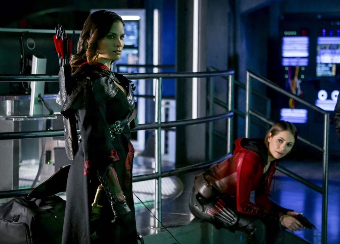 Arrow -- "The Thanatos Guild" -- Image Number: AR616a_0183.jpg -- Pictured (L-R): Katrina Law as Nyssa Al-Ghul and Willa Holland as Thea Queen/Speedy -- Photo: Shane Harvey/The CW -- © 2018 The CW Network, LLC. All rights reserved. Arrow -- "The Thanatos Guild" -- Image Number: AR616a_0183.jpg -- Pictured (L-R): Katrina Law as Nyssa Al-Ghul and Willa Holland as Thea Queen/Speedy -- Photo: Shane Harvey/The CW -- © 2018 The CW Network, LLC. All rights reserved.