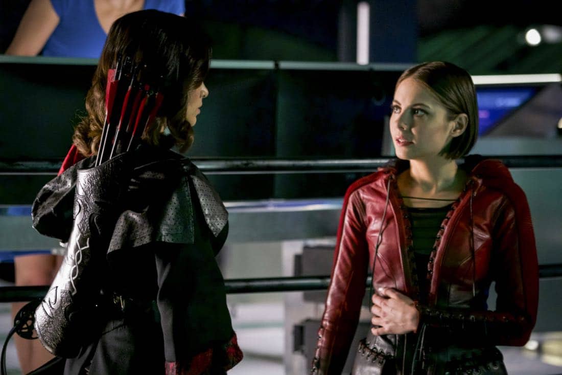 Arrow -- "The Thanatos Guild" -- Image Number: AR616a_0274.jpg -- Pictured (L-R): Katrina Law as Nyssa Al-Ghul and Willa Holland as Thea Queen/Speedy -- Photo: Shane Harvey/The CW -- é 2018 The CW Network, LLC. All rights reserved. Arrow -- "The Thanatos Guild" -- Image Number: AR616a_0274.jpg -- Pictured (L-R): Katrina Law as Nyssa Al-Ghul and Willa Holland as Thea Queen/Speedy -- Photo: Shane Harvey/The CW -- é 2018 The CW Network, LLC. All rights reserved.