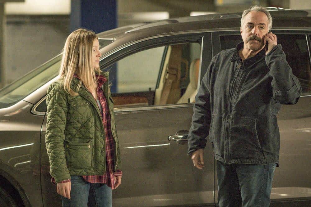 CHICAGO P.D. -- "Ghosts" Episode 518 -- Pictured: (l-r) Tracy Spiridakos as Hailey Upton, Titus Welliver as Ronald Booth -- (Photo by: Matt Dinerstein/NBC)