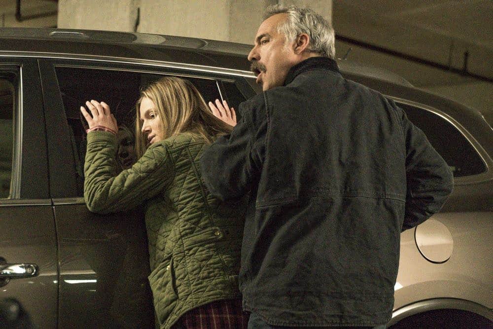 CHICAGO P.D. -- "Ghosts" Episode 518 -- Pictured: (l-r) Tracy Spiridakos as Hailey Upton, Titus Welliver as Ronald Booth -- (Photo by: Matt Dinerstein/NBC)