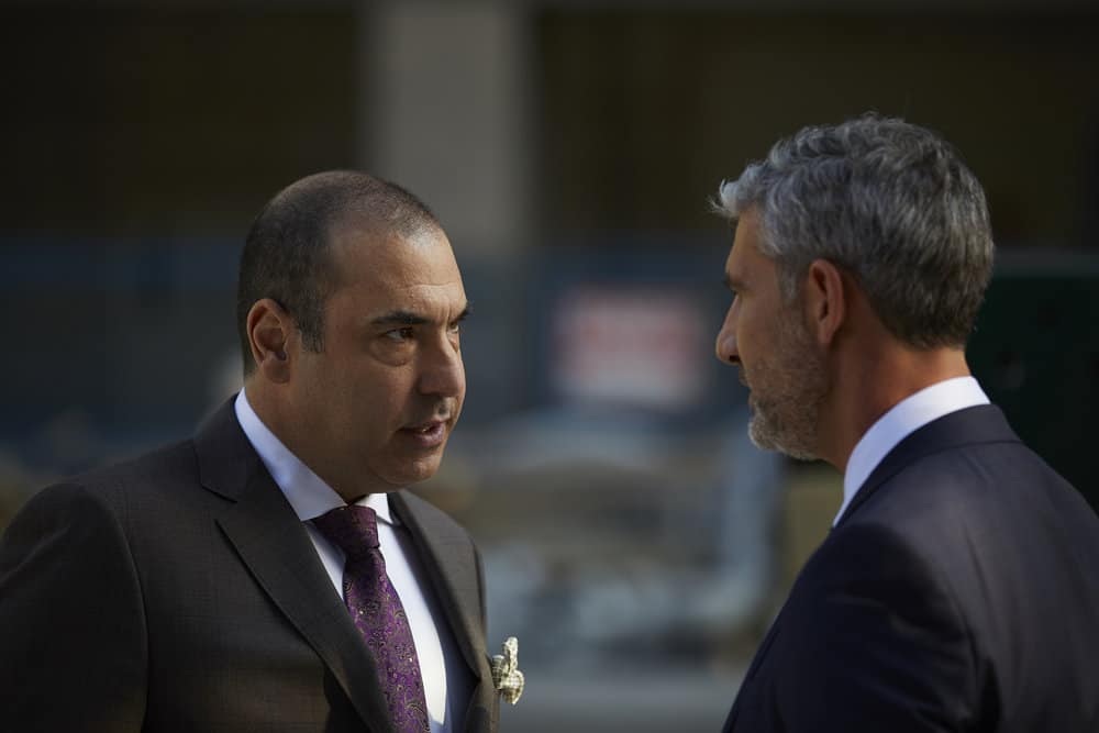 SUITS -- Episode 711 -- Pictured: Louis Litt as Rick Hoffman -- (Photo by: Shane Mahood/USA Network) SUITS -- Episode 711 -- Pictured: Louis Litt as Rick Hoffman -- (Photo by: Shane Mahood/USA Network)