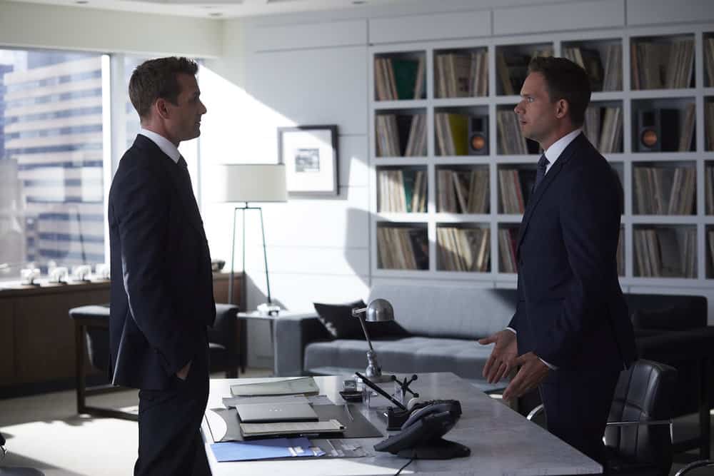 SUITS -- Episode 711 -- Pictured: (l-r) Gabriel Macht as Harvey Spector, Patrick J. Adams as Mike Ross -- (Photo by: Shane Mahood/USA Network)
