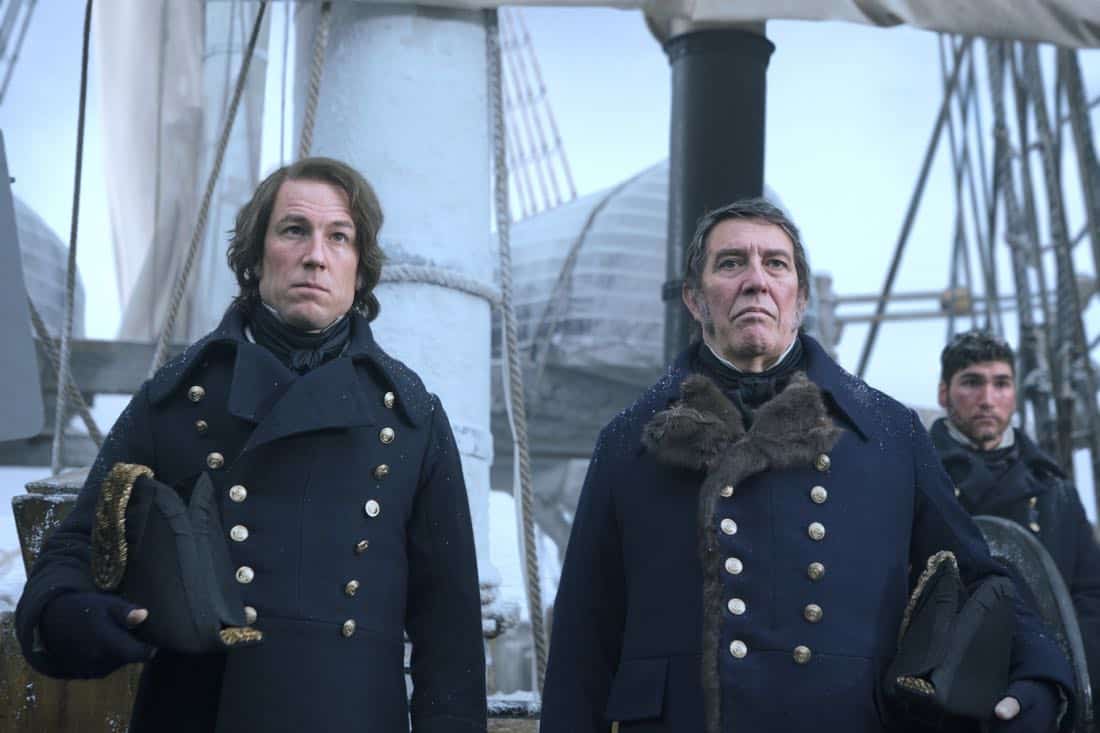 Tobias Menzies as James Fitzjames, Ciarán Hinds as John Franklin - The Terror _ Season 1, Episode 1 - Photo Credit: Aidan Monaghan/AMC
