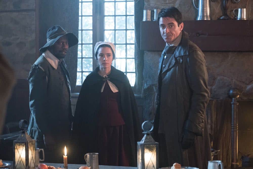 TIMELESS -- "The Salem Witch Hunt" Episode 204 -- Pictured: (l-r) Michael Barrett as Rufus Carlin, Abigail Spencer as Lucy Preston, Goran Visnjic as Garcia Flynn -- (Photo by: Patrick Wymore/NBC)
