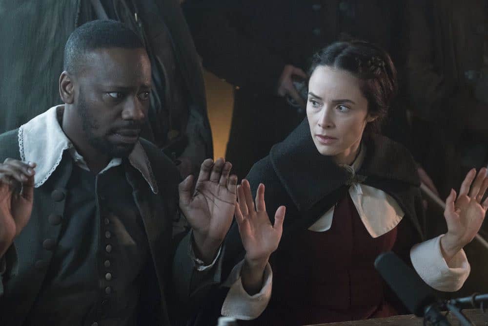 TIMELESS -- "The Salem Witch Hunt" Episode 204 -- Pictured: (l-r) Michael Barrett as Rufus Carlin, Abigail Spencer as Lucy Preston -- (Photo by: Patrick Wymore/NBC)