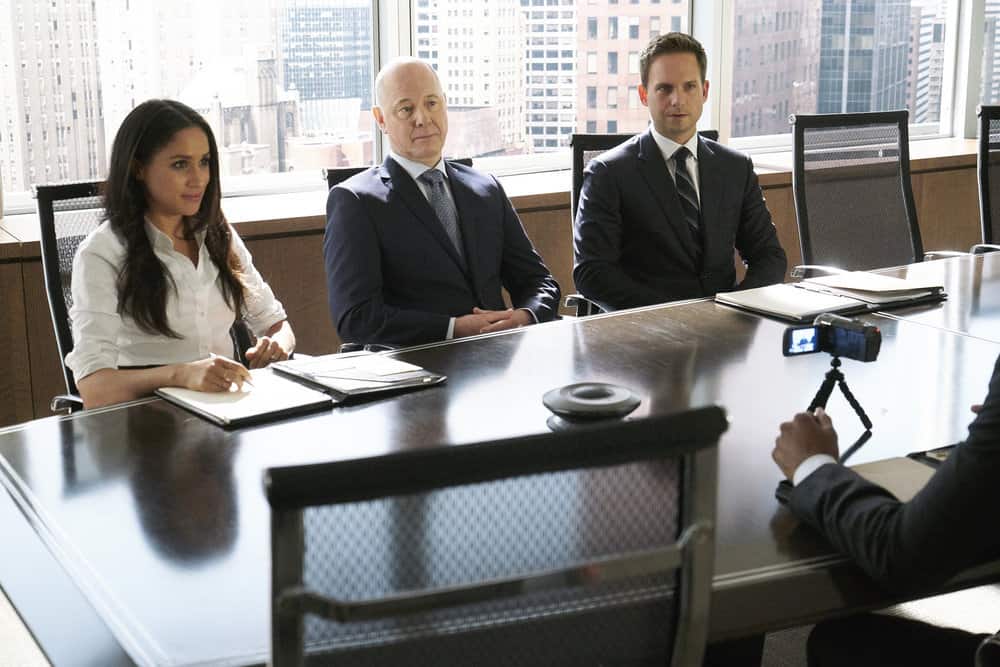 SUITS -- "Bad Man" Episode 712 -- Pictured: (l-r) Meghan Markle as Rachel Zane, Patrick J. Adams as Mike Ross -- (Photo by: Ian Watson/USA Network)