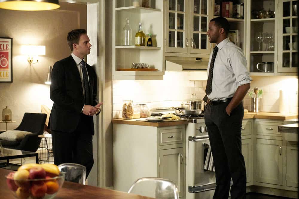 SUITS -- "Bad Man" Episode 712 -- Pictured: (l-r) Patrick J. Adams as Mike Ross, Jordan Johnson-Hinds as Oliver Grady -- (Photo by: Ian Watson/USA Network)