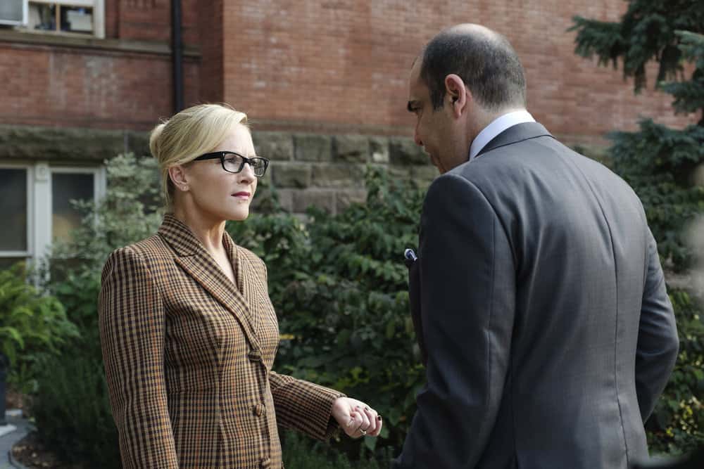 SUITS -- "Bad Man" Episode 712 -- Pictured: (l-r) Rachael Harris as Sheila Sazs, Rick Hoffman as Louis Litt -- (Photo by: Christos Kalohoridis/USA Network)