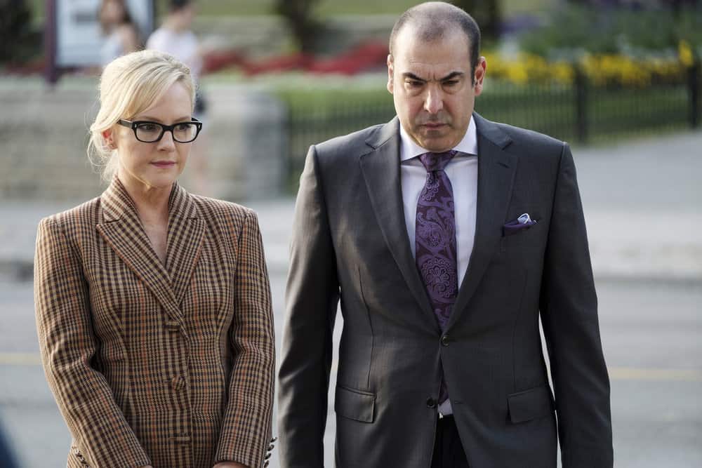 SUITS -- "Bad Man" Episode 712 -- Pictured: (l-r) Rachael Harris as Sheila Sazs, Rick Hoffman as Louis Litt -- (Photo by: Christos Kalohoridis/USA Network)