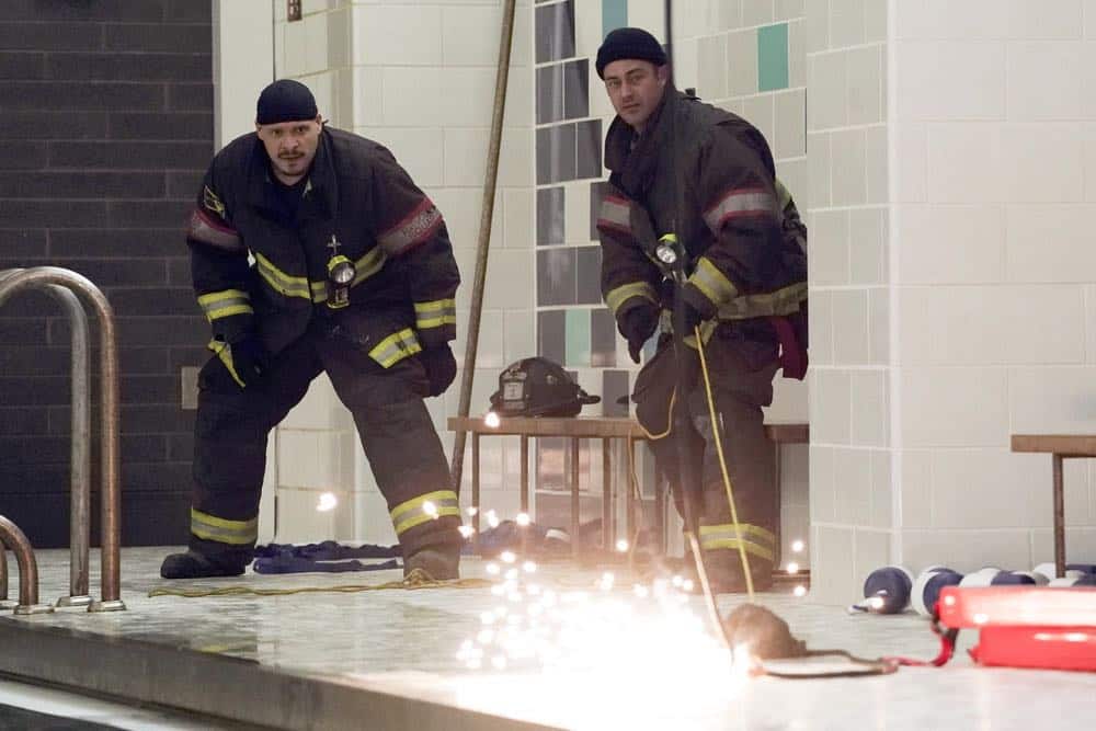 CHICAGO FIRE -- "Put White On Me" Episode 617 -- Pictured: (l-r) Joe Minoso as Joe Cruz, Taylor Kinney as Kelly Severide -- (Photo by: Elizabeth Morris/NBC)