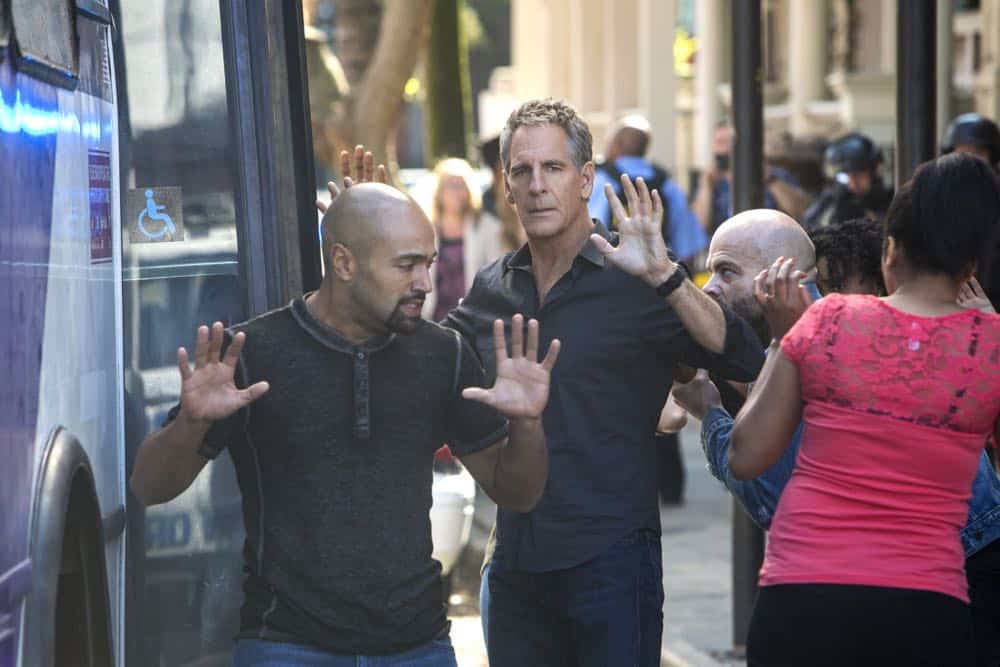 ÃÂPowder KegààPride and his bar patrons, including Sydney Halliday (Riann Steele) who is visiting Pride after leaving the Army, are held hostage by a group of volatile thieves, on NCIS: NEW ORLEANS, Tuesday, April 17 (10:00-11:00 PM, ET/PT) on the CBS Television Network. Pictured: Scott Bakula as Special Agent Dwayne Pride Photo: Skip Bolen/CBS é2018 CBS Broadcasting, Inc. All Rights Reserved