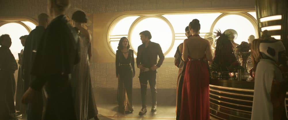 Emilia Clarke is Qi’ra and Alden Ehrenreich is Han Solo in SOLO: A STAR WARS STORY. Emilia Clarke is Qi’ra and Alden Ehrenreich is Han Solo in SOLO: A STAR WARS STORY.