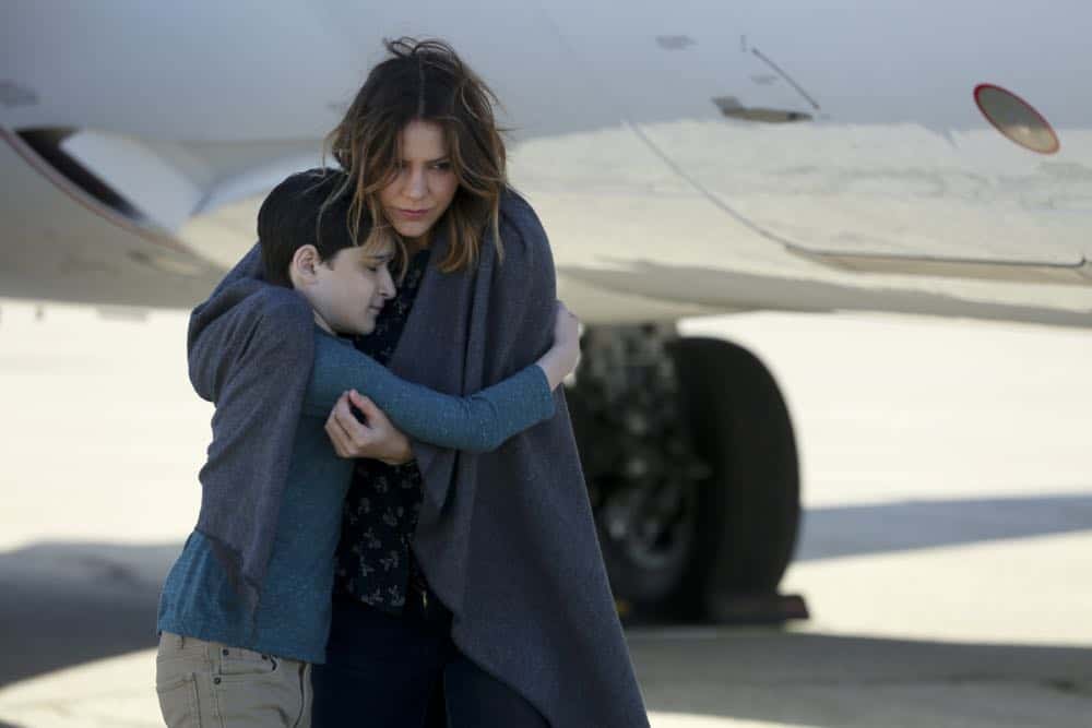 "Kenny and the Jet" -- Paige's maternal side goes into high gear when Team Scorpion must save an unconscious, hypothermic boy stuck in the wheel well of their airborne airplane. Also, Walter's white lie to Paige starts to take a toll on him, and Paige realizes something's up, on SCORPION, Monday, April 9 (10:00-11:00 PM, ET/PT) on the CBS Television Network. Pictured: Riley B. Smith, Katharine McPhee. Photo: Michael Yarish/CBS é2018 CBS Broadcasting, Inc. All Rights Reserved