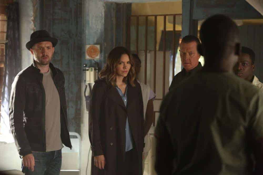 "A Lie in the Sand" -- Team Scorpion heads to Northeast Africa where they must carefully navigate a minefield in order to save the lives of local villagers. Also, Paige and Walter's relationship takes a shocking turn, and Toby and Happy make an important decision, on the fourth season finale of SCORPION, Monday, April 16 (10:00-11:00 PM, ET/PT) on the CBS Television Network. Pictured: Eddie Kaye Thomas, Katharine McPhee, Robert Patrick. Photo: Michael Yarish/CBS é2018 CBS Broadcasting, Inc. All Rights Reserved